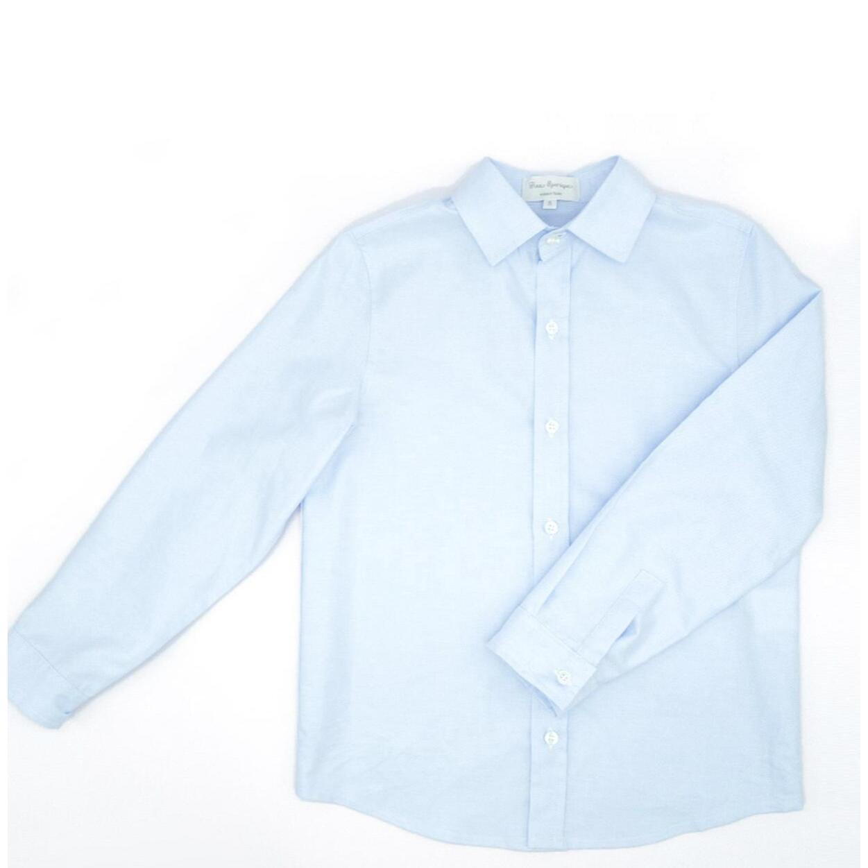 Camisa oxford azul de manga larga. Con cuello italiano.