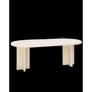 Table de salle à manger ovale en microciment de teinte blanc cassé disponible en différentes tailles