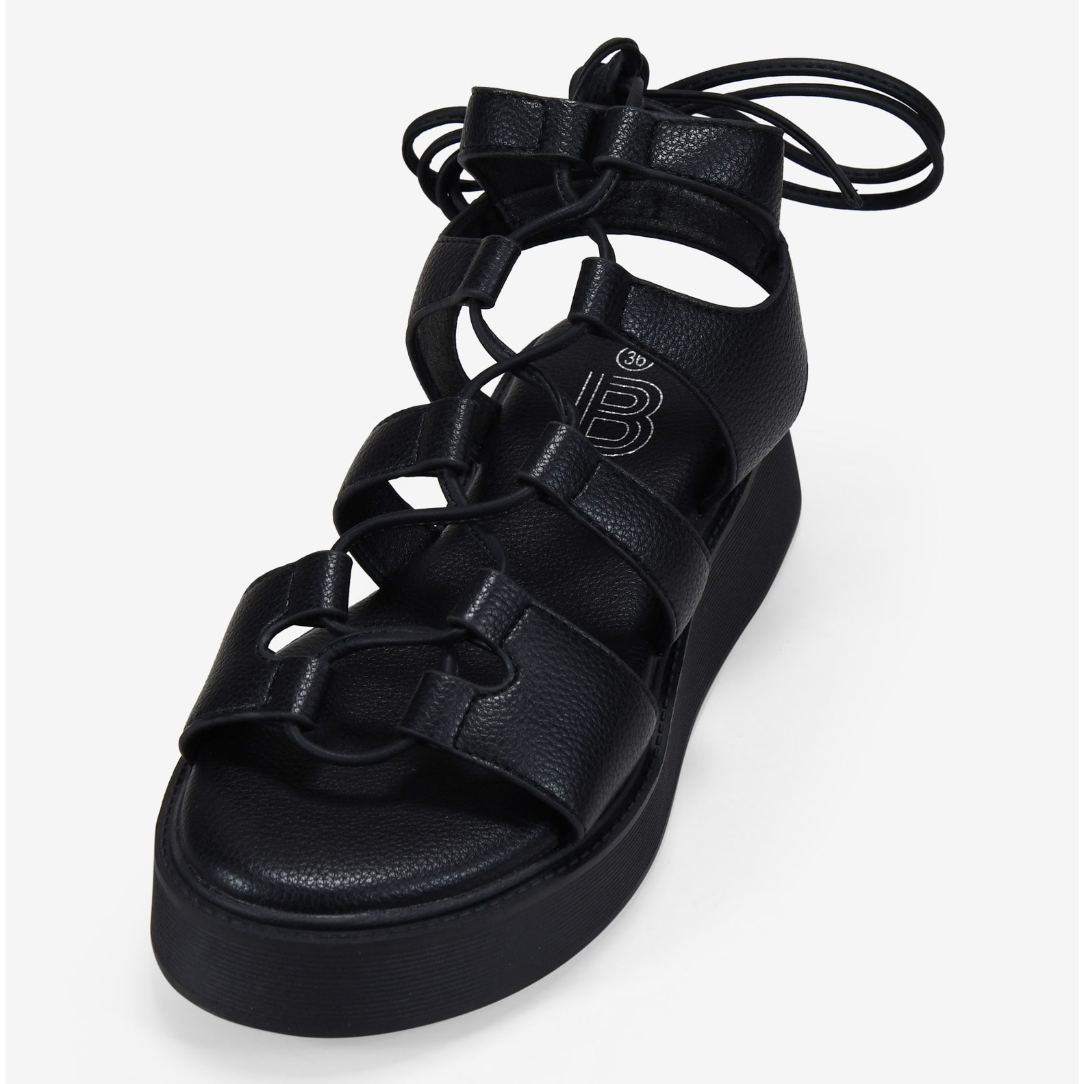 Sandalias negras con tiras atadas