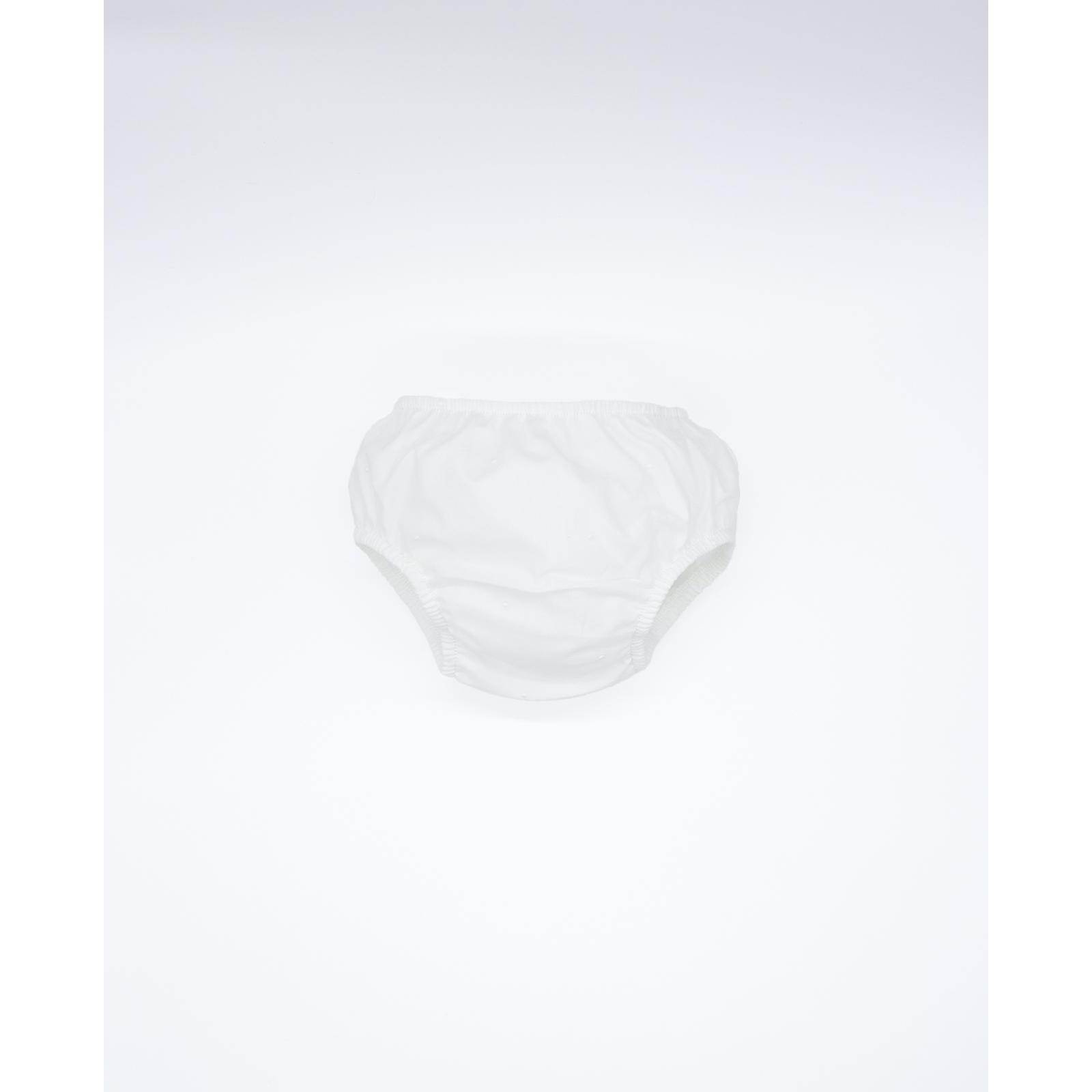 Cubrepañal de tul bordado. Elastico en la cintura y en las piernas.