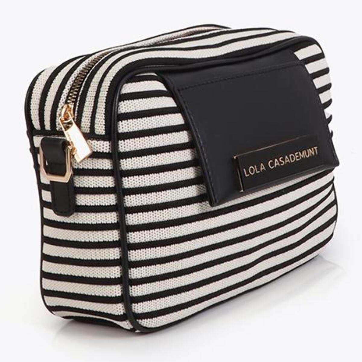 Tessuto a righe incrociate abbinato ad effetto pelle