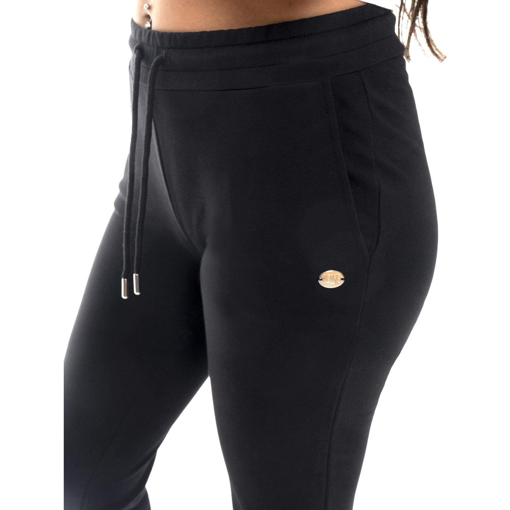 Pantalones básicos de algodón sin forro polar para mujer de Leone con puños.