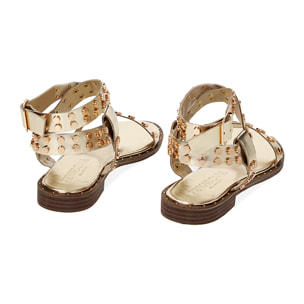 Sandalias planas doradas en laminado