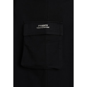 Gonna longuette media con spacchi laterali e maxi tasca