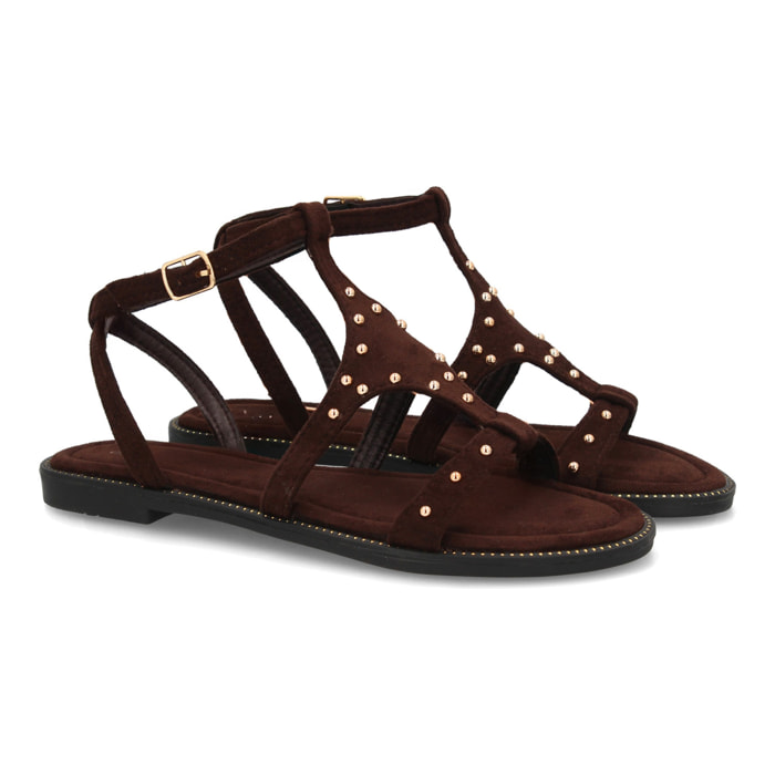 Sandalia plana elegante mujer tachuelas