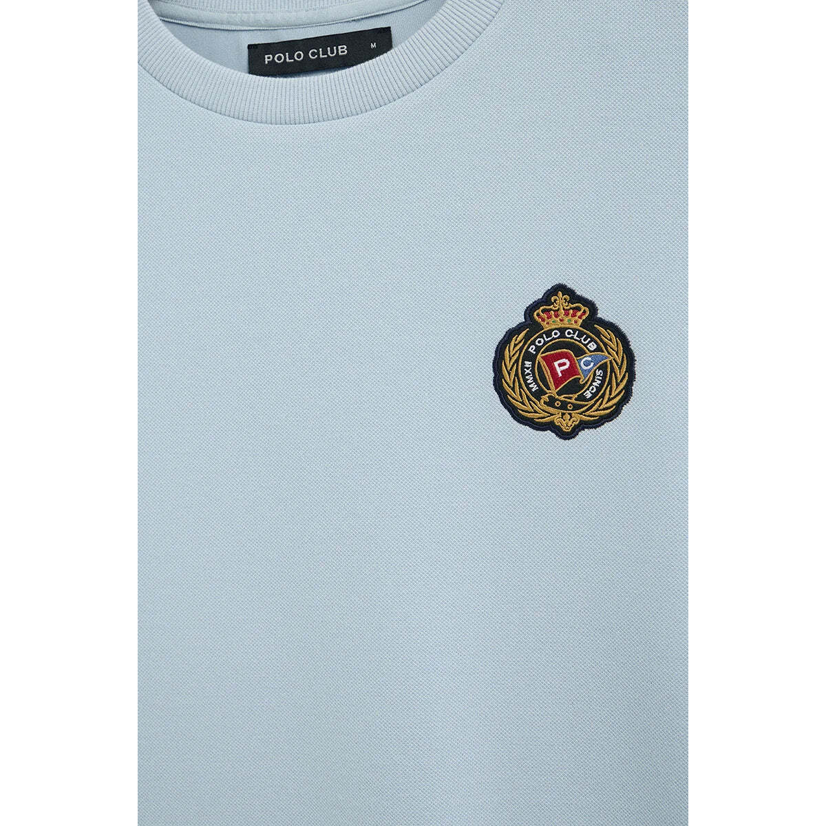 Camiseta azul claro de manga corta con logo náutico Polo Club