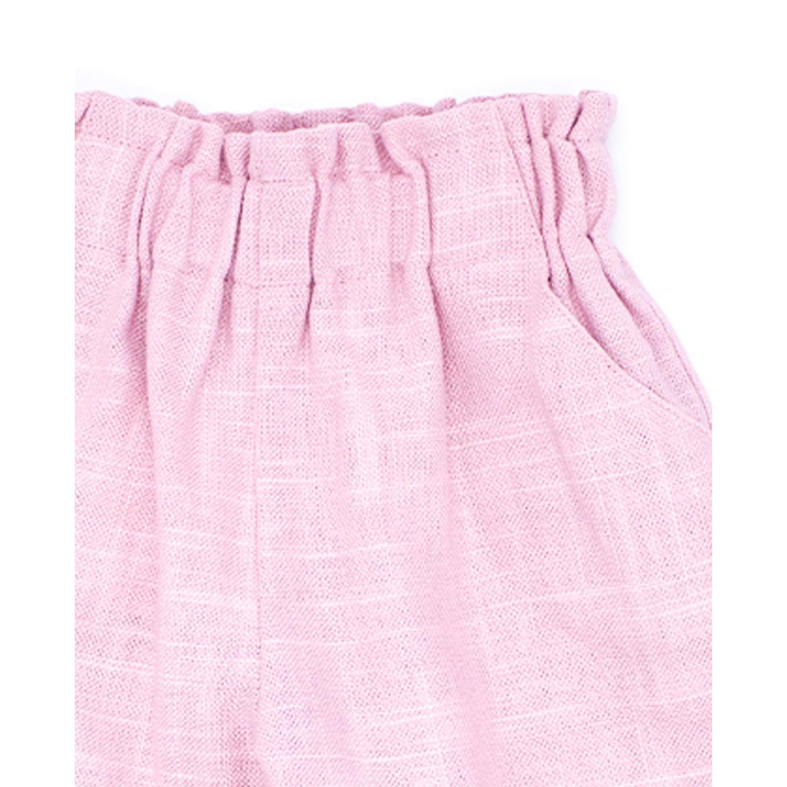 Pantalón largo de lino rosa. Elastico en la cintura, picunela en el bajo.