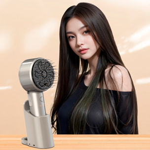 Pettine atomizzatore con massaggio a due velocità e base.