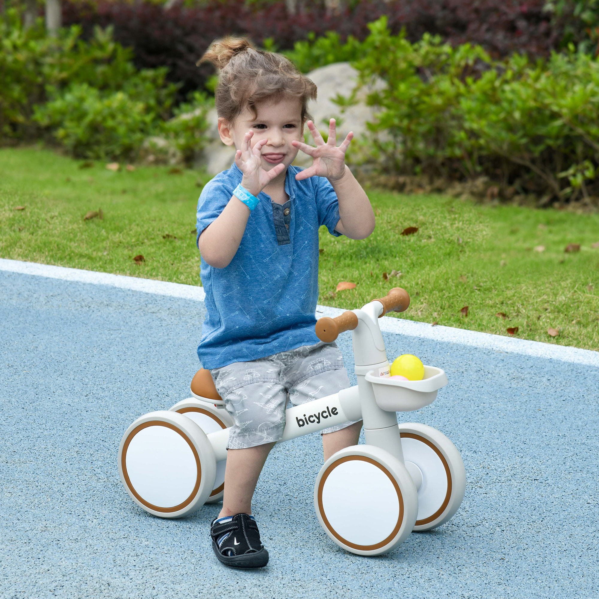 Bicicleta sin Pedales para Niños de 12-36 Meses Bicicleta de Equilibrio con Asiento Ajustable Cesta y 4 Ruedas Silenciosas Carga 20 kg 56x27x39 cm Blanco y Marrón