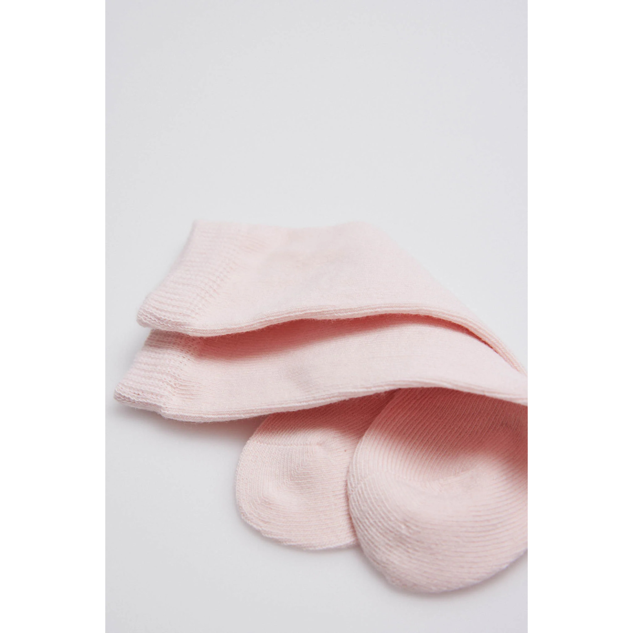 Calzini lunghi rosa basico per neonato