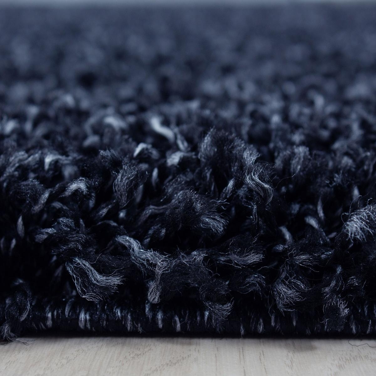 Tapis poils longs shaggy tissé motif uni ROCA