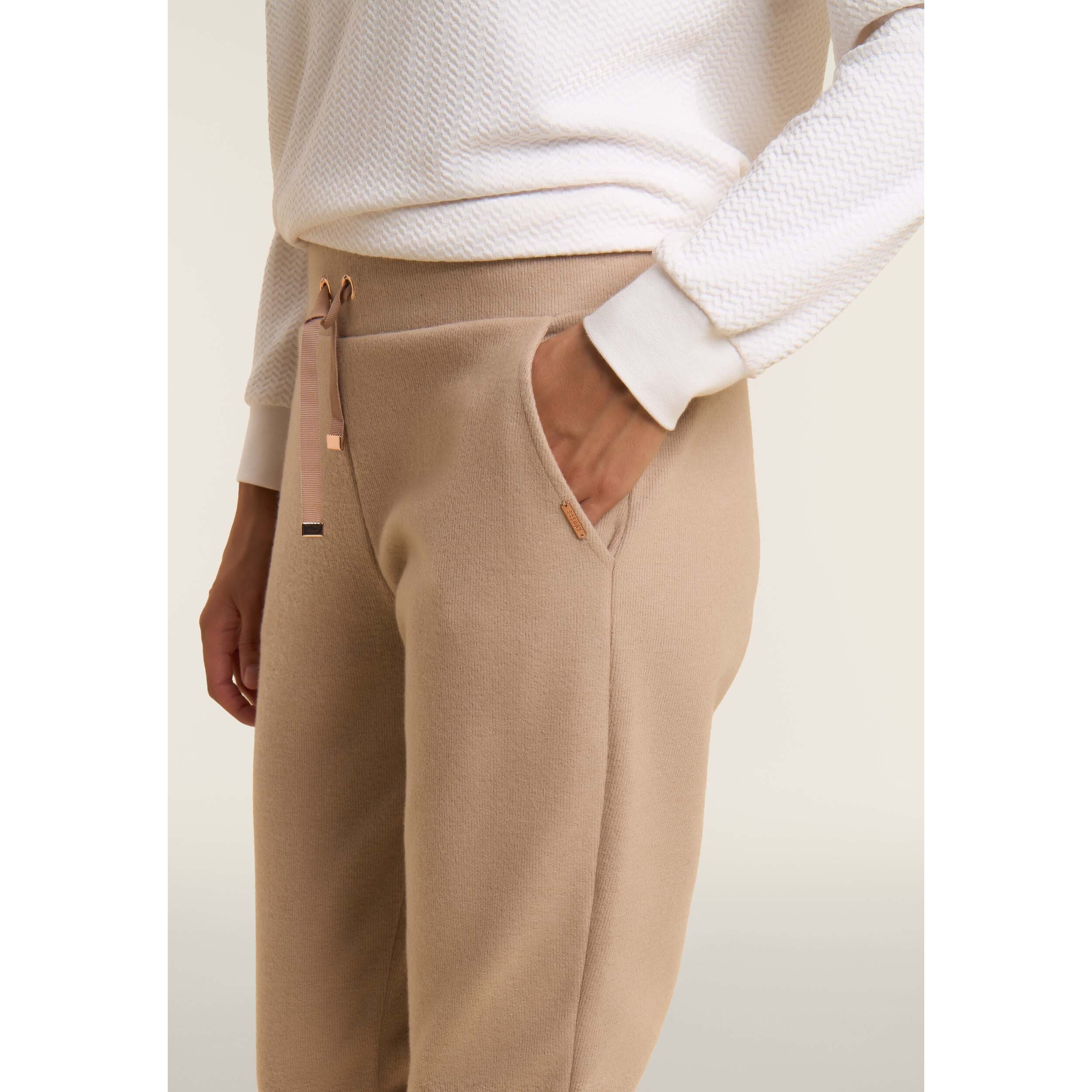 Pantaloni donna effetto tricot con polsini