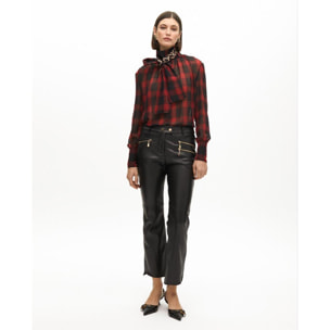 Pantaloni effetto pelle con zip