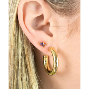 Piercing dorado con piedras malva