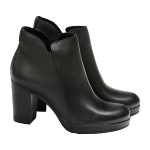 Tronchetto in vera pelle con tacco e plateaux