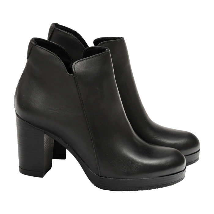 Tronchetto in vera pelle con tacco e plateaux