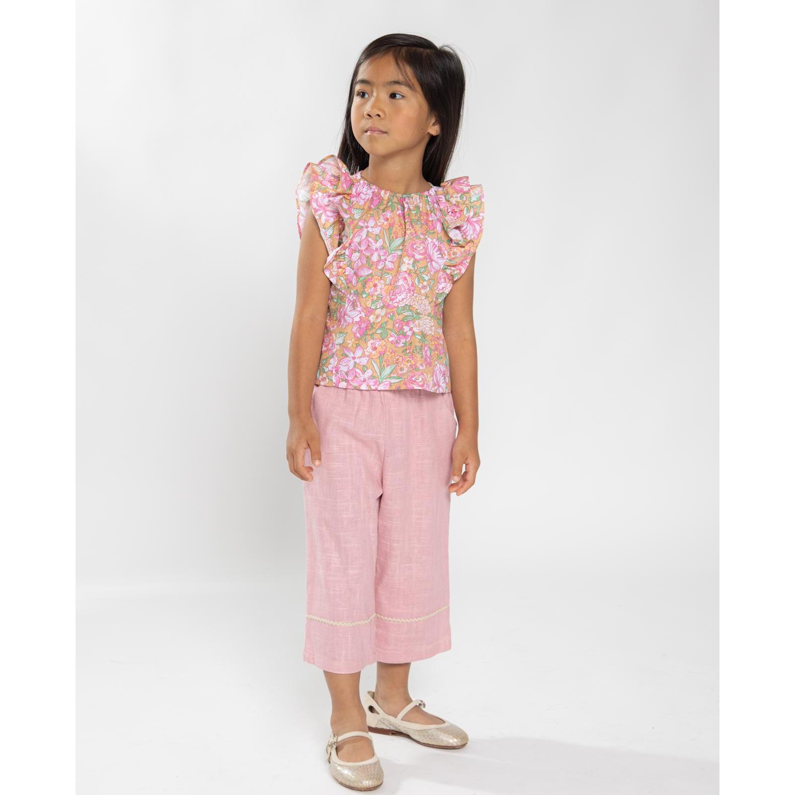 Pantalón largo de lino rosa. Elastico en la cintura, picunela en el bajo.