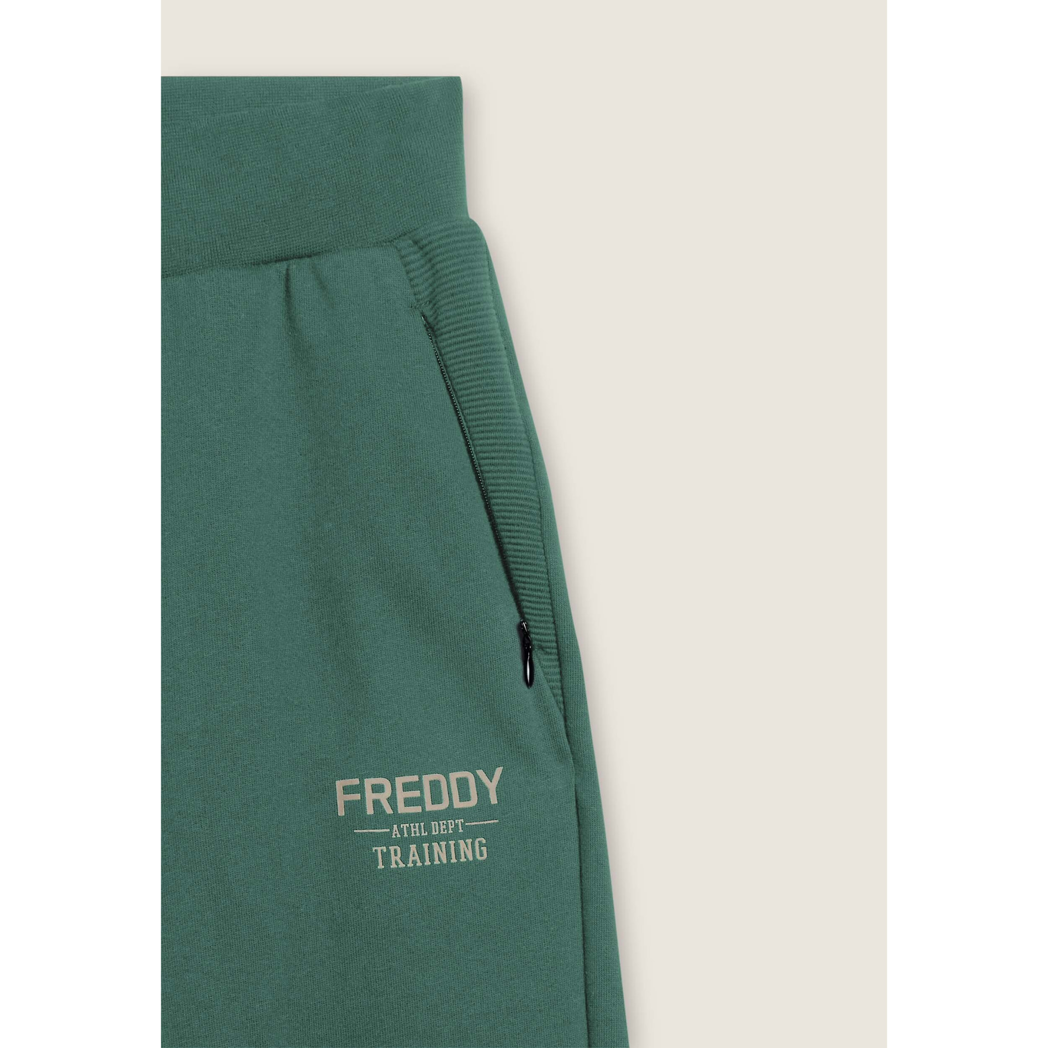 Pantaloni in felpa con fondo a polsino e dettagli rigati