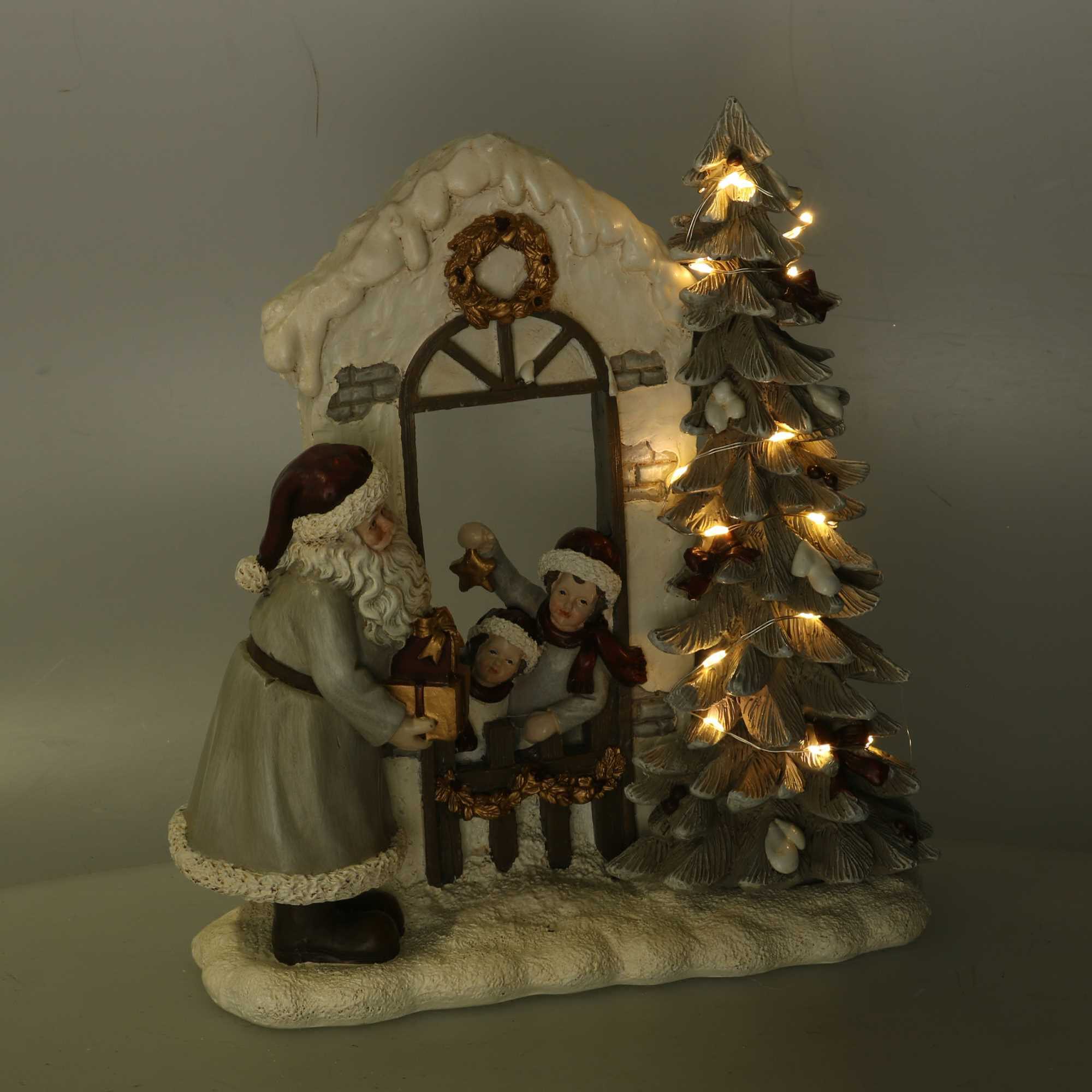 Statua in resina babbo natale e bambini grigio con led cm22x9,5h22,5