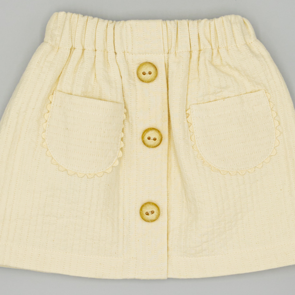 Falda Beige De Tejido Texturizado Con Bolsillos