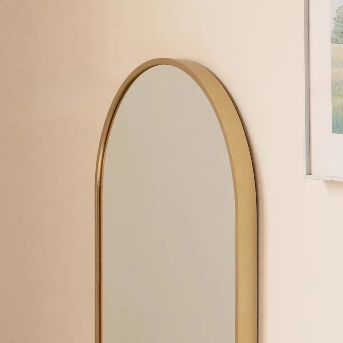 Specchio ovale da parete moderno con cornice dorata