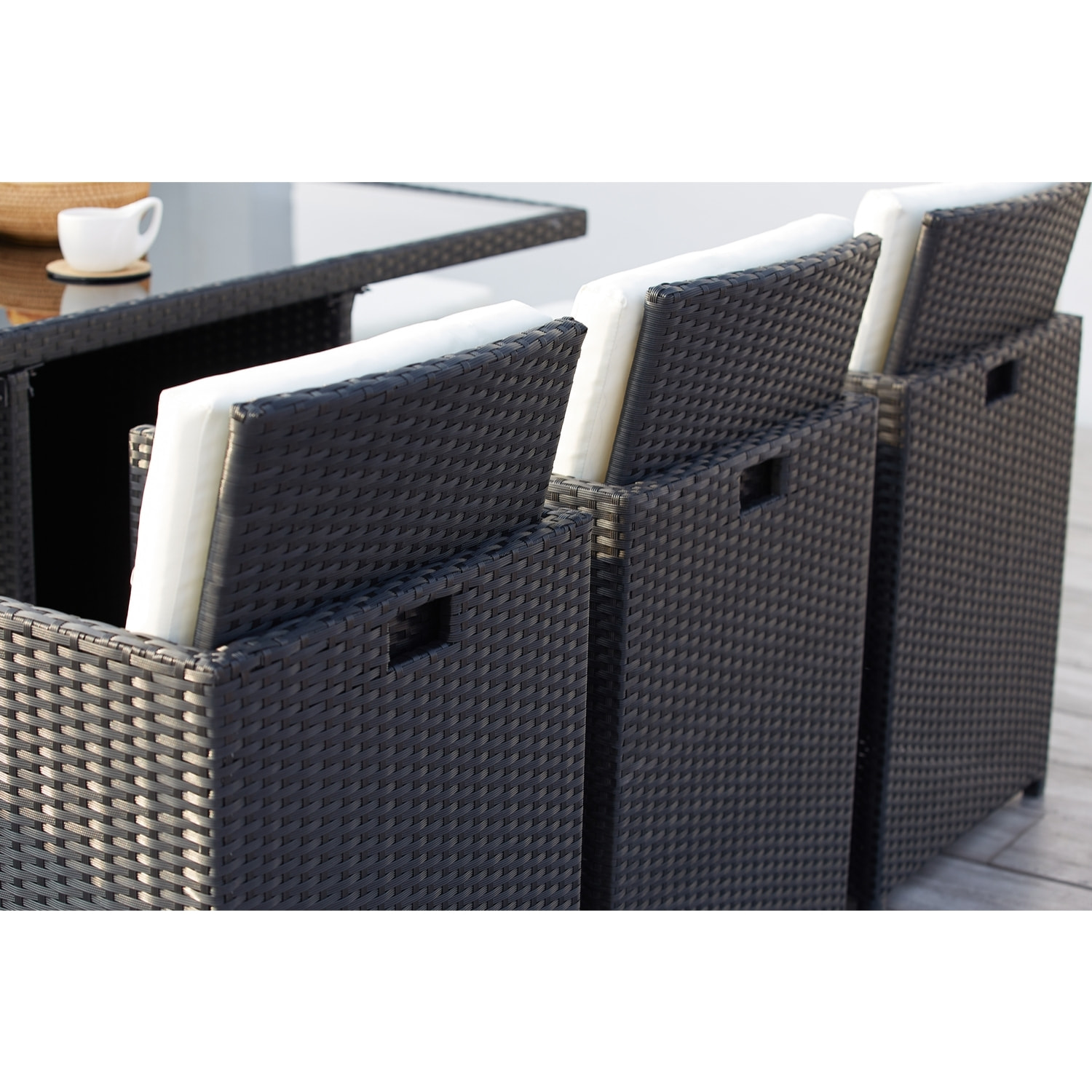 Table et chaises 10 places encastrables résine noir/blanc DALMA