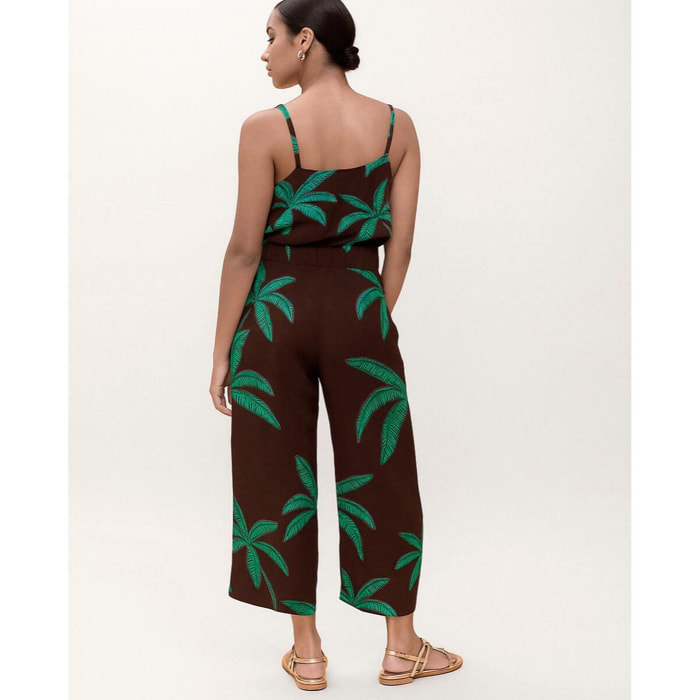 Pantaloni con sfondo marrone e palme