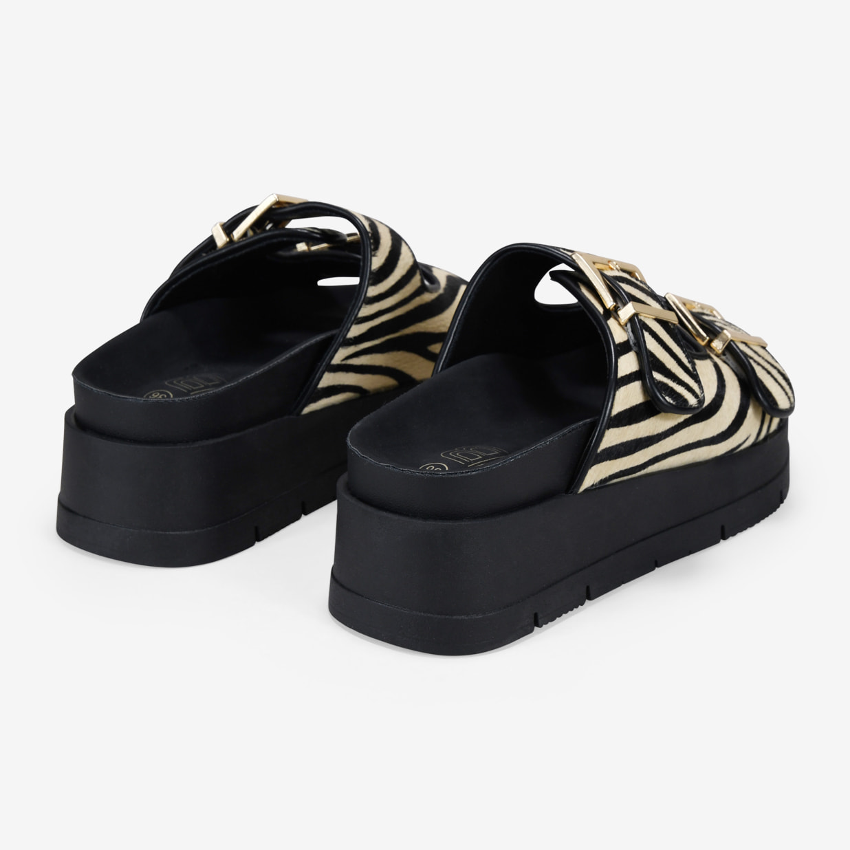 Sandalias de plataforma con pelo print cebra