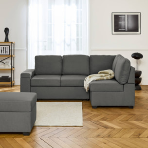 Canapé d'angle convertible. 3 places en tissu gris foncé avec pouf