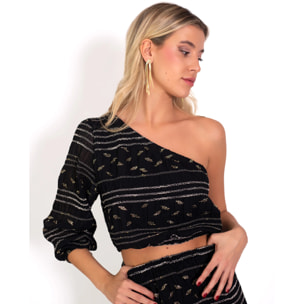 Blusa de mujer asimétrica con brillo.