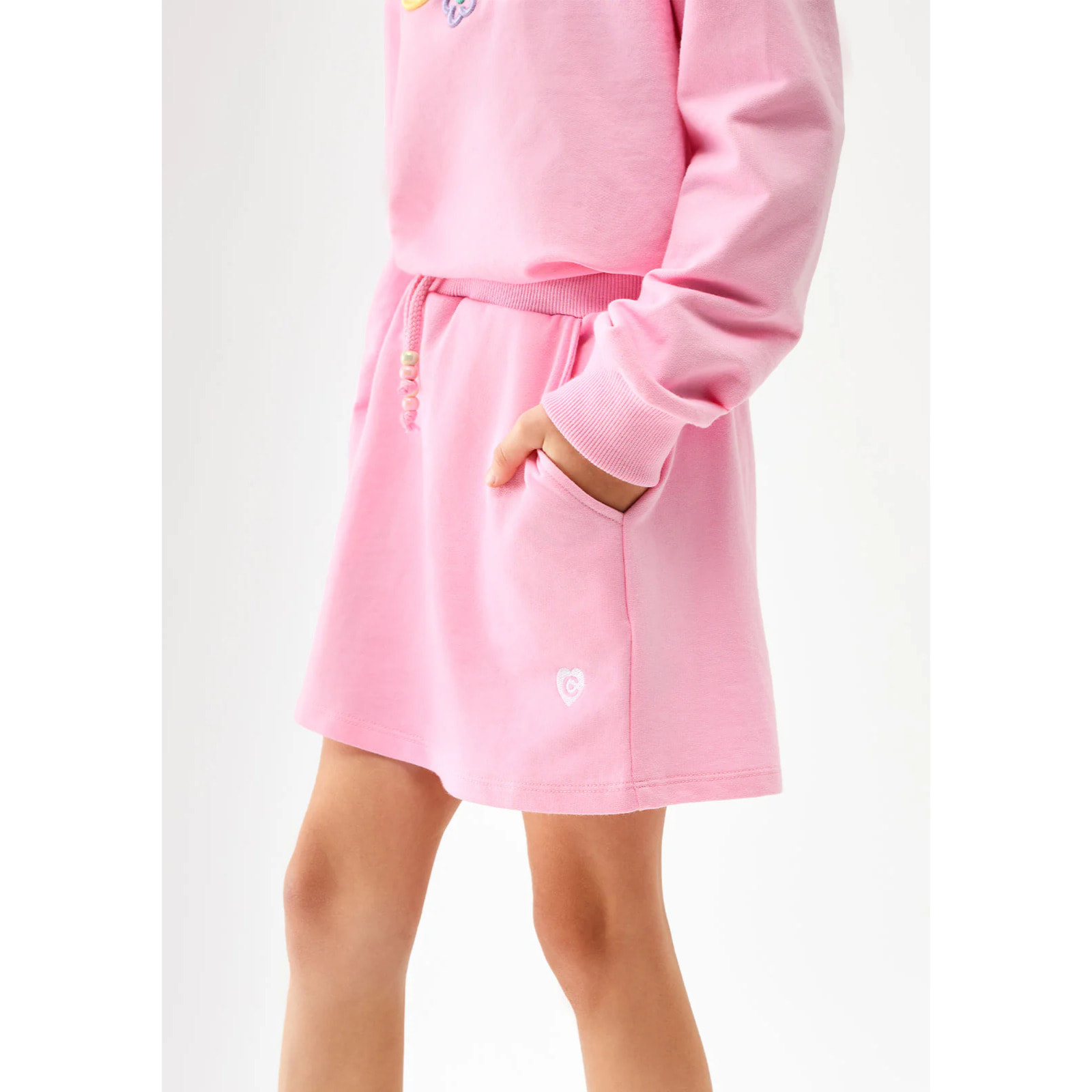 Gonna da bambina rosa con logo laterale