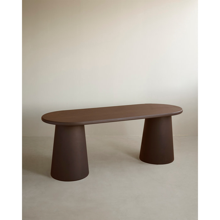 Table de salle à manger ovale en microciment ton marron en différentes tailles
