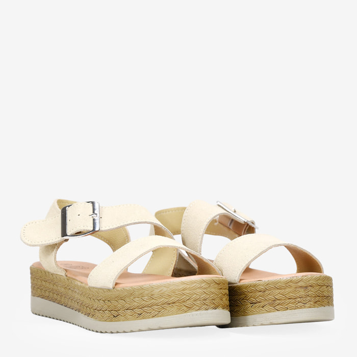 Sandalias de piel beige con hebilla y plataforma
