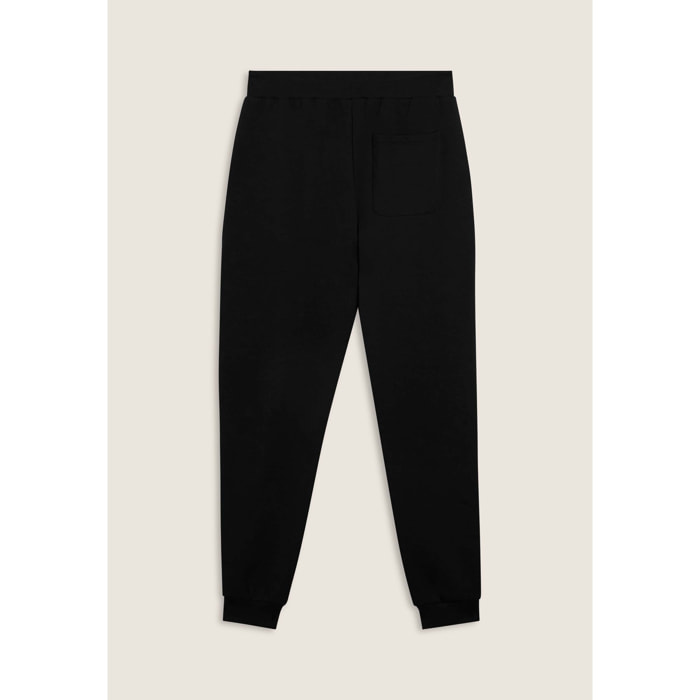Pantaloni slim in interlock con maxi logo in rilievo