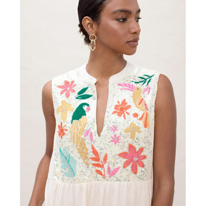 Abito con volant a pappagallo