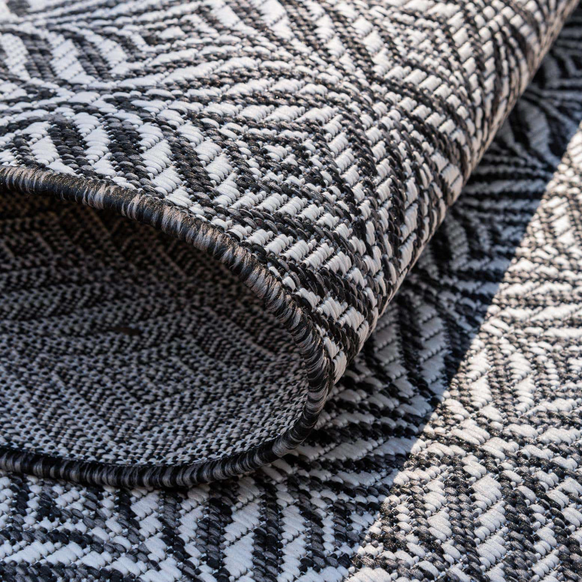 Moa- tapis d'extérieur rond noir à motif blanc