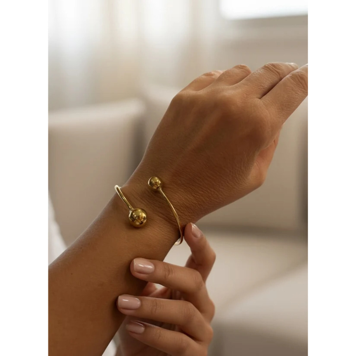 Pulsera aro laton y doble bola en chapado dorado