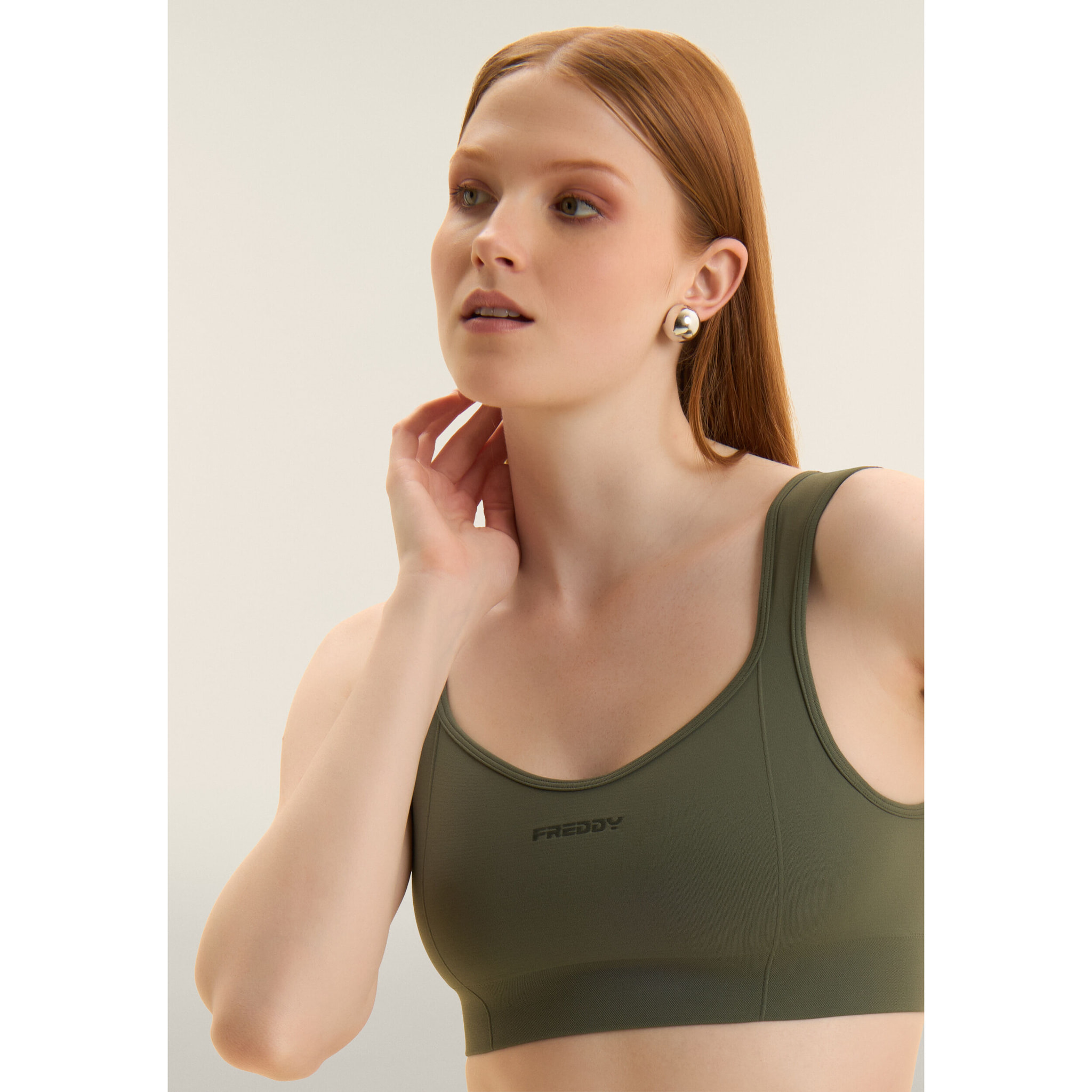 Top sportivo seamless con scollo a cuore e supporto leggero