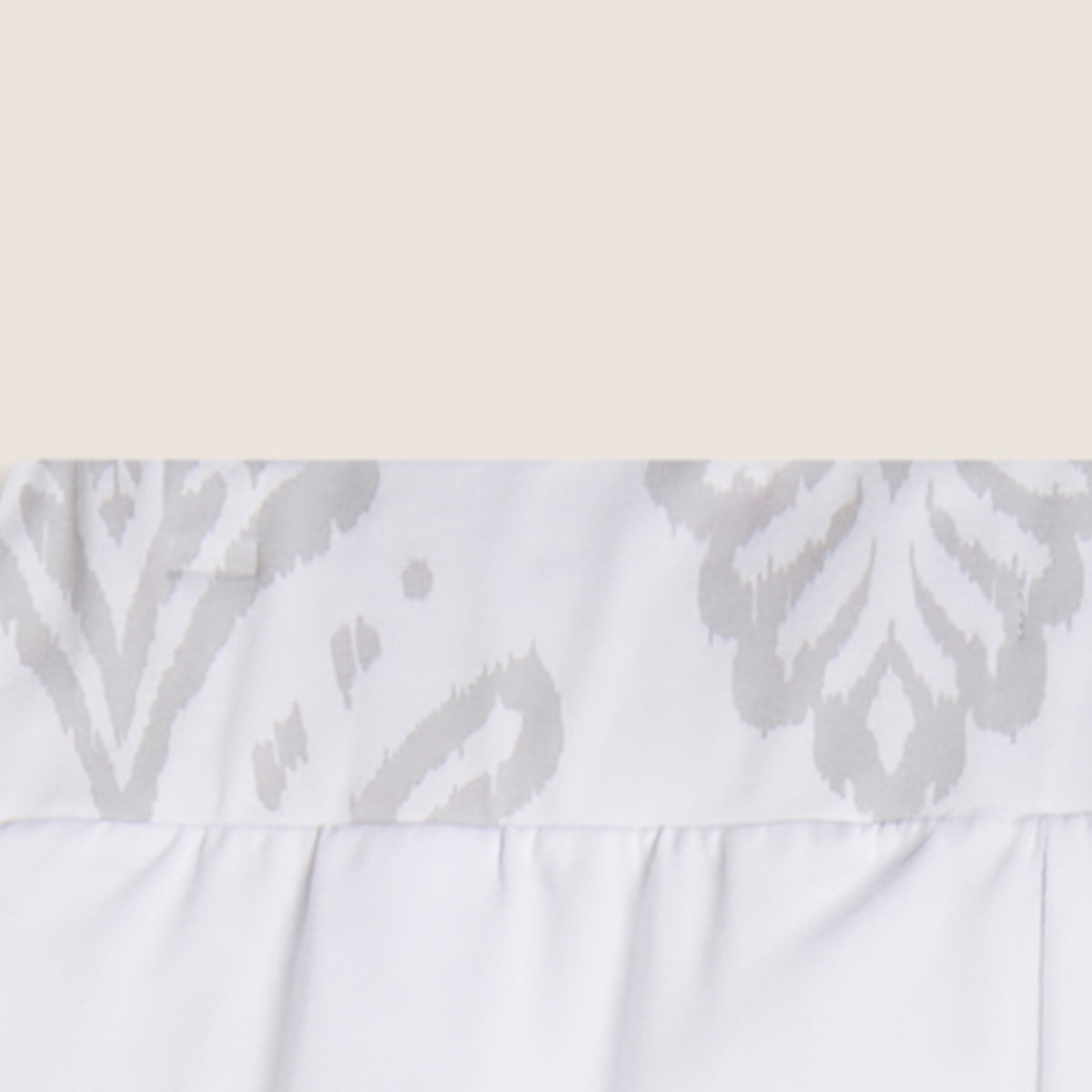 Short sportivi con fascia in vita floreale