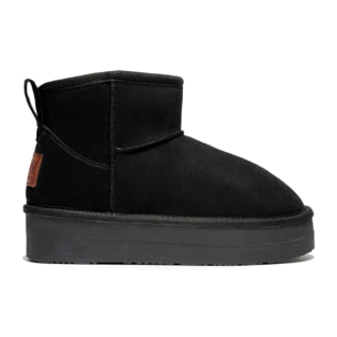 Botas negras de caña baja acolchadas