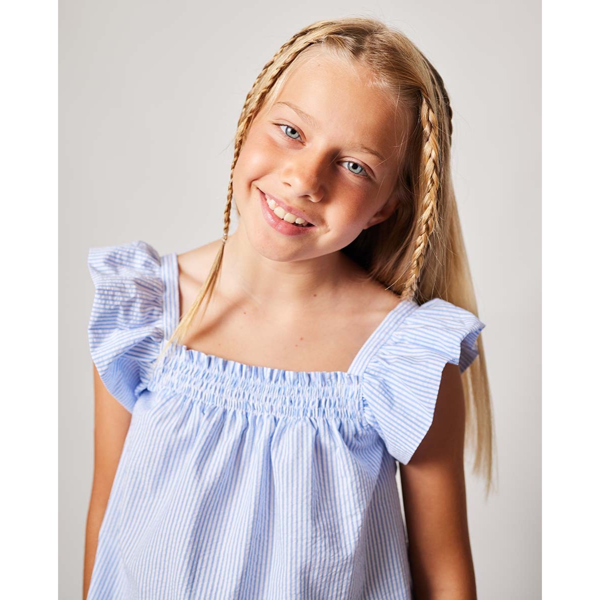 BLUSA CON GOMITAS RAYAS AZUL Y BLANCO