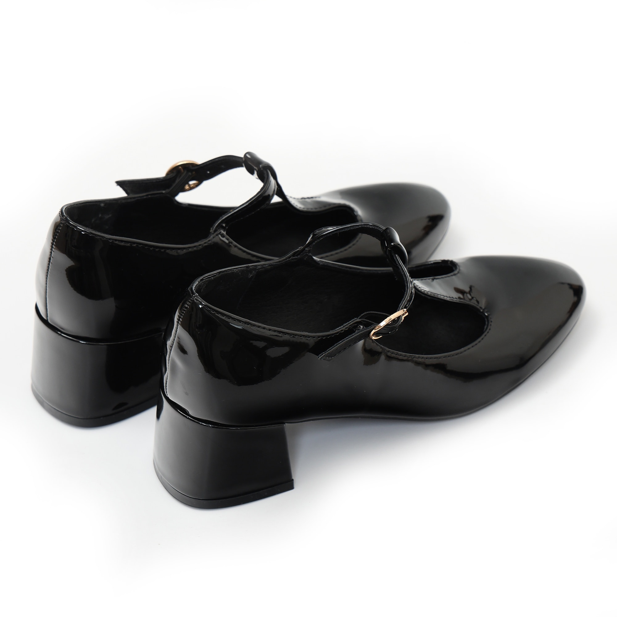 Dècolletè in simil pelle verniciata con tacco basso quadrato