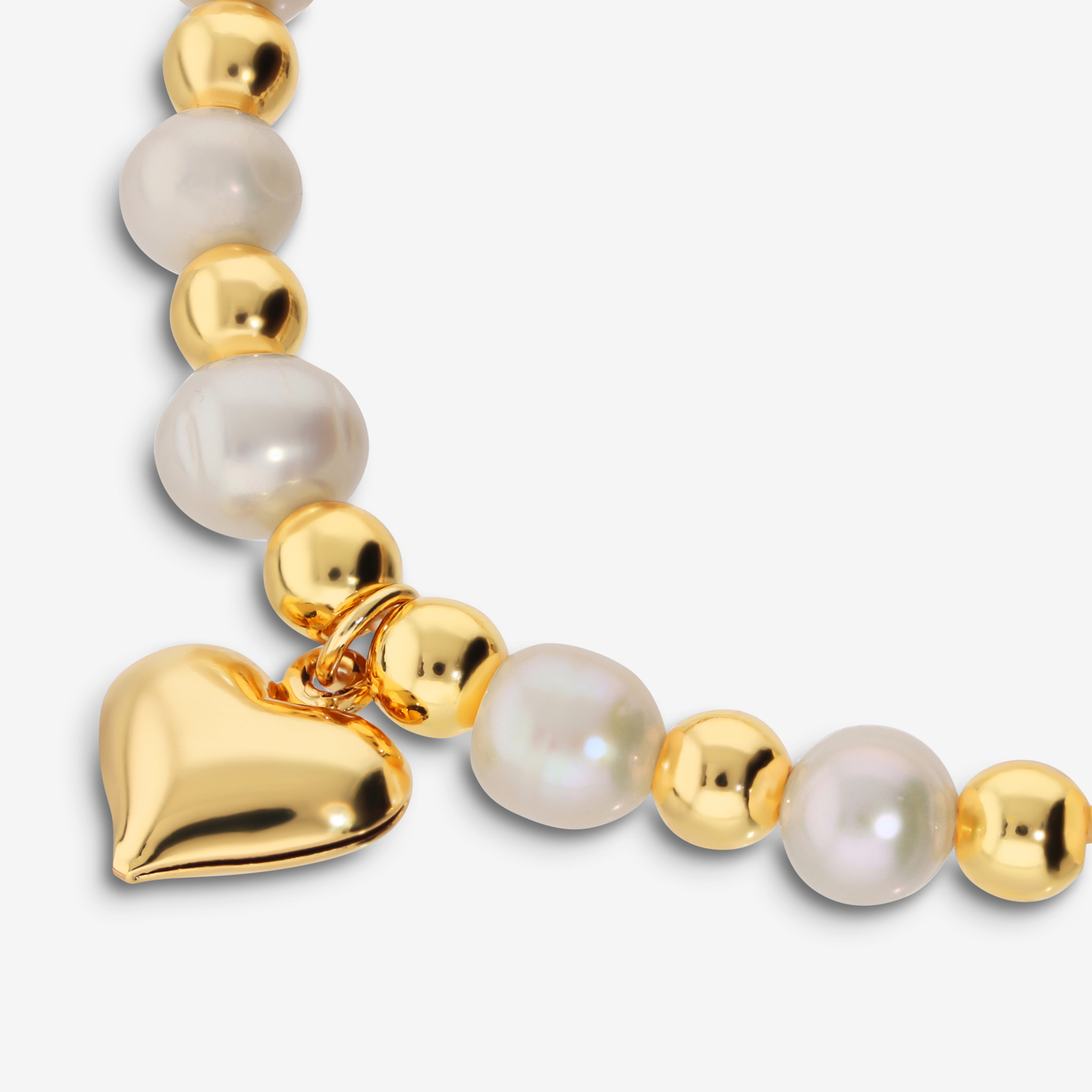 Bracciale di Perle Bianche d'Acqua Dolce con Bead Lucide e Ciondolo Cuore Bombato