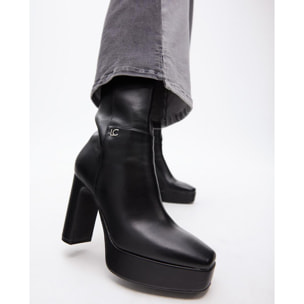 Stivaletto con zeppa effetto suede