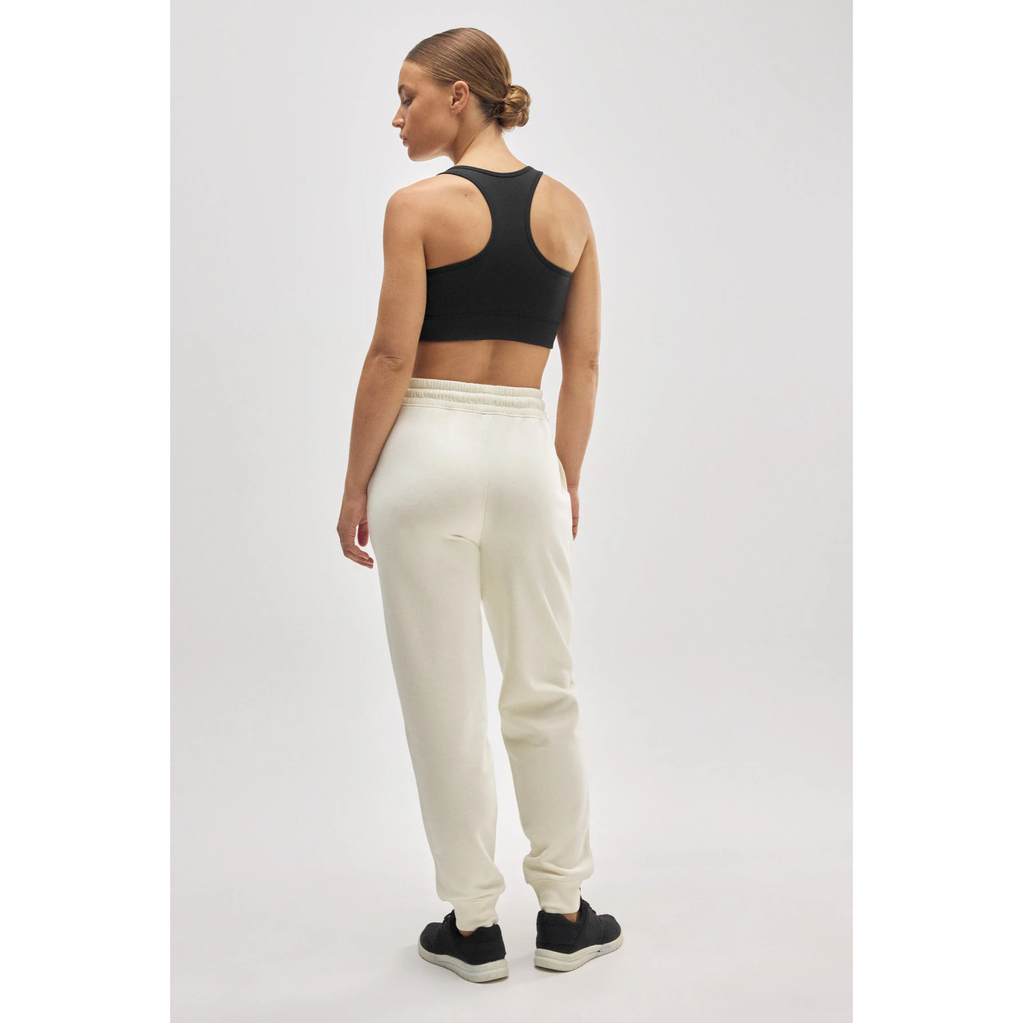 Pantaloni jogger in pile avorio con cintura regolabile