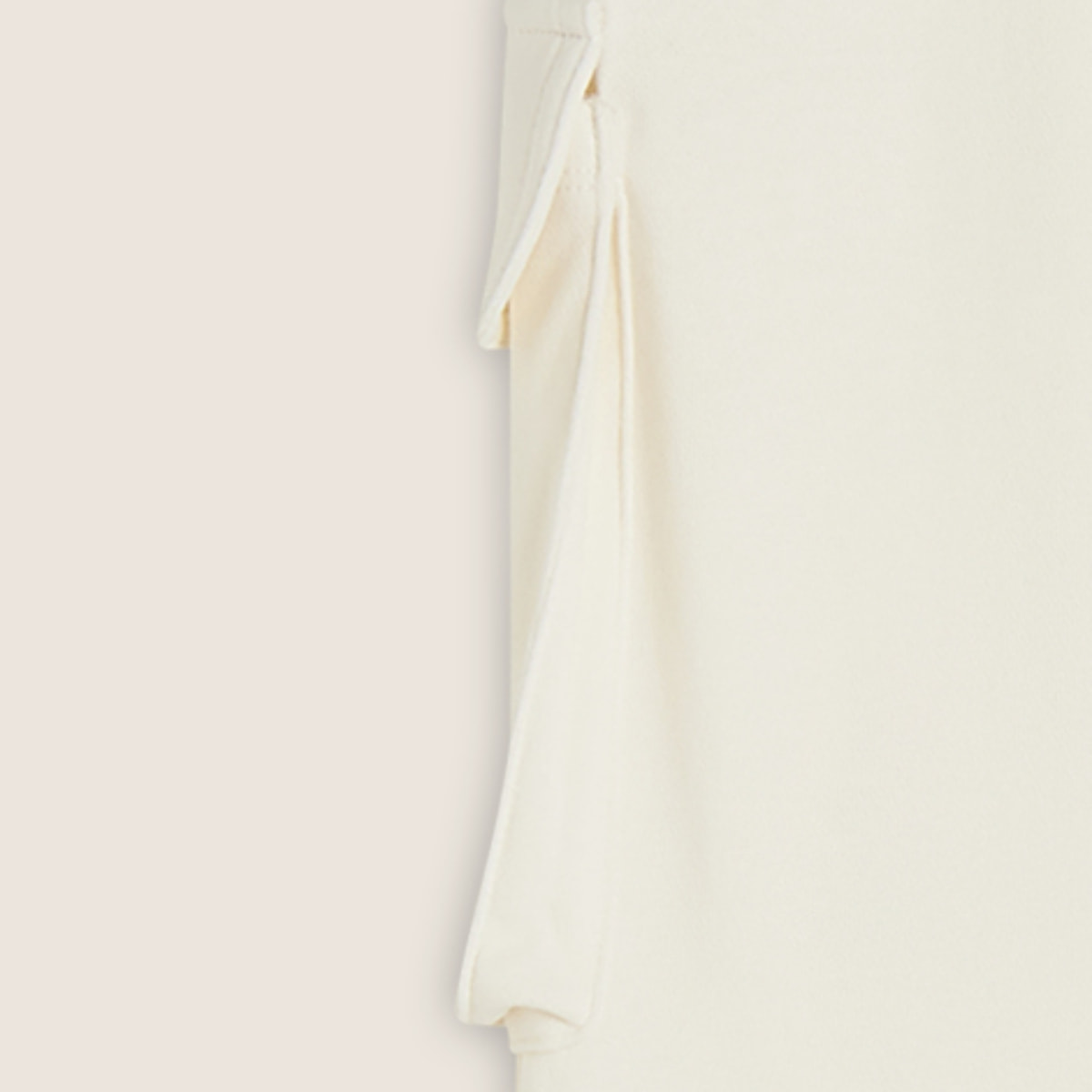 Gonna longuette con spacchi laterali e maxi tasca