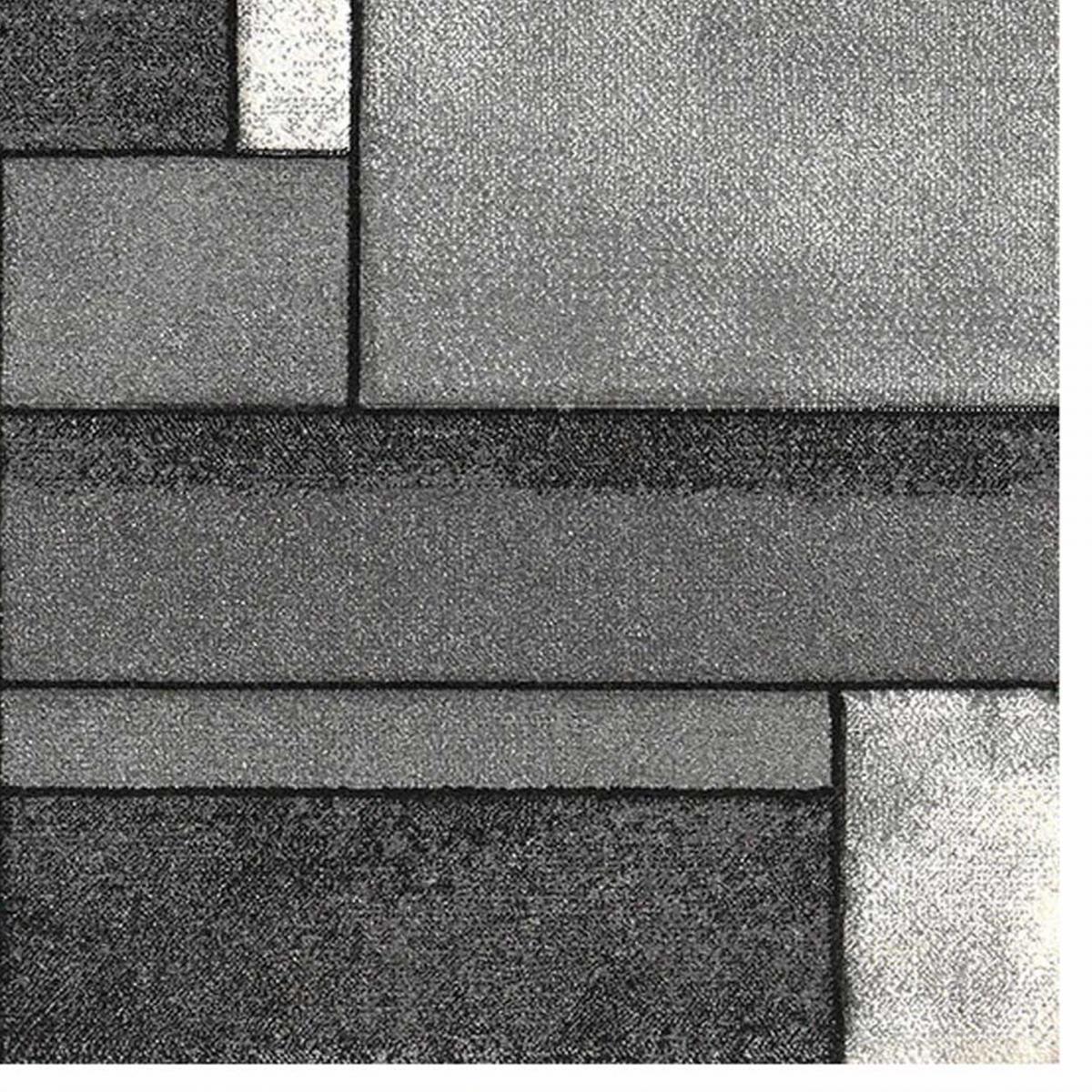 Tapis Tuho aux couleurs grises et aux motifs géométriques