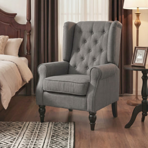 Fauteuil à oreilles style Chesterfield dossier capitonné grand confort bois noir tissu gris foncé