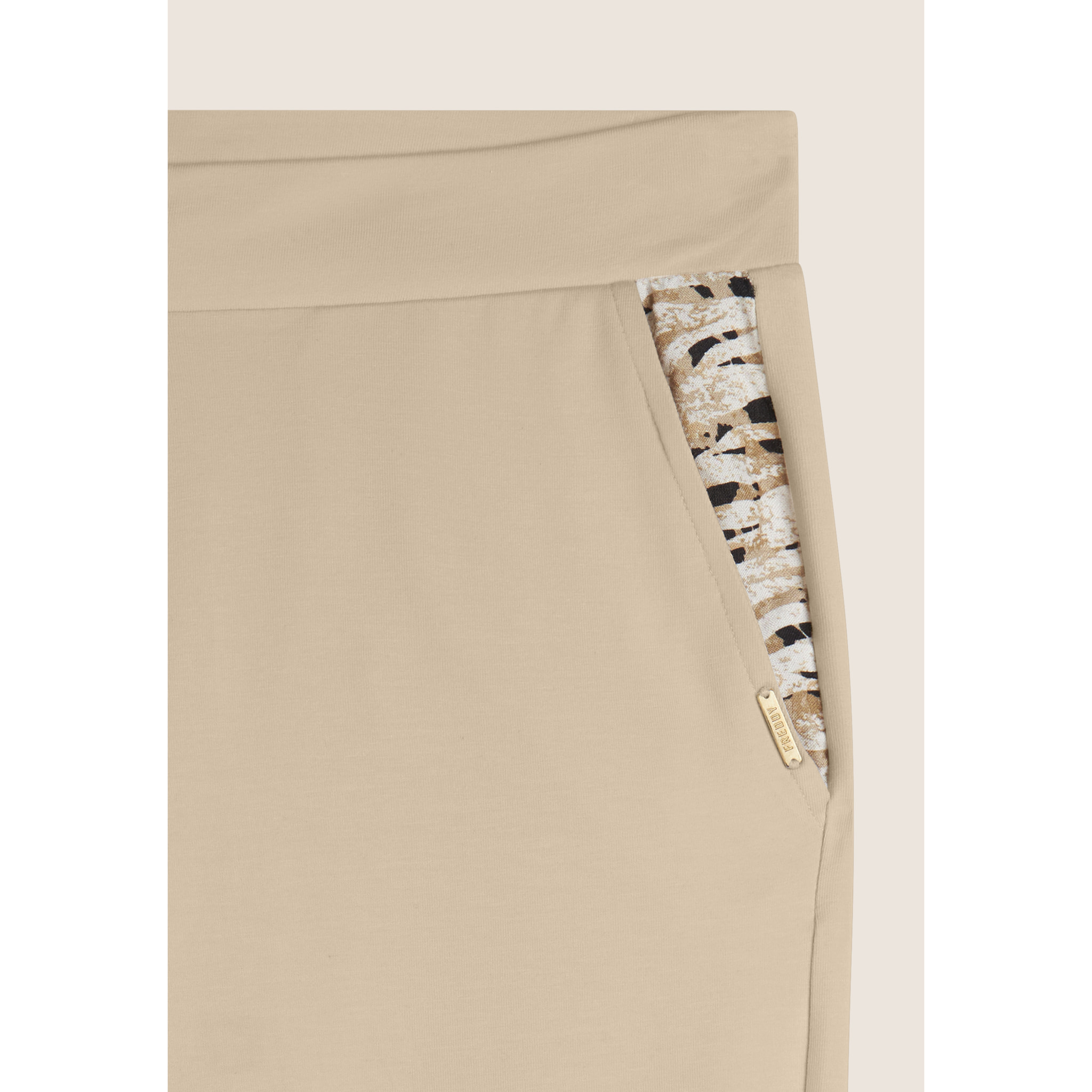 Pantaloni in jersey con apertura tasche animalier