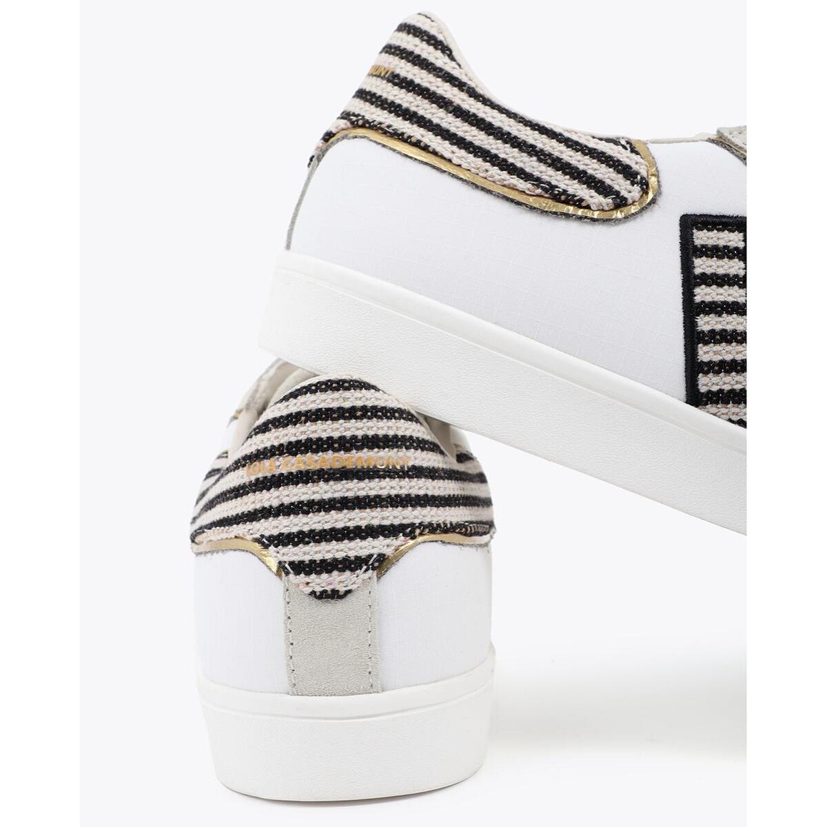 Scarpa sportiva con logo in tessuti abbinati e dettagli in pelle